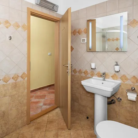 Four-bedroom In Casa vacanze